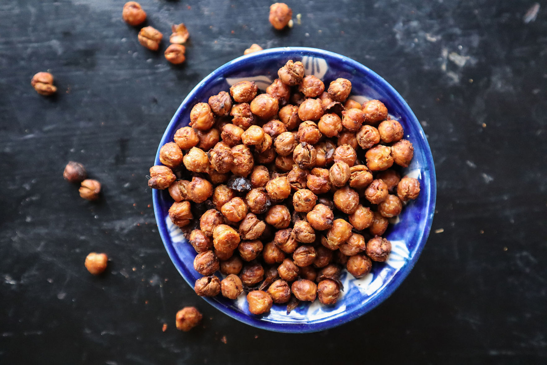Crispy, roasted cickpeas tossed in warm spices such as cumin or curry are a heart-healthy snack.